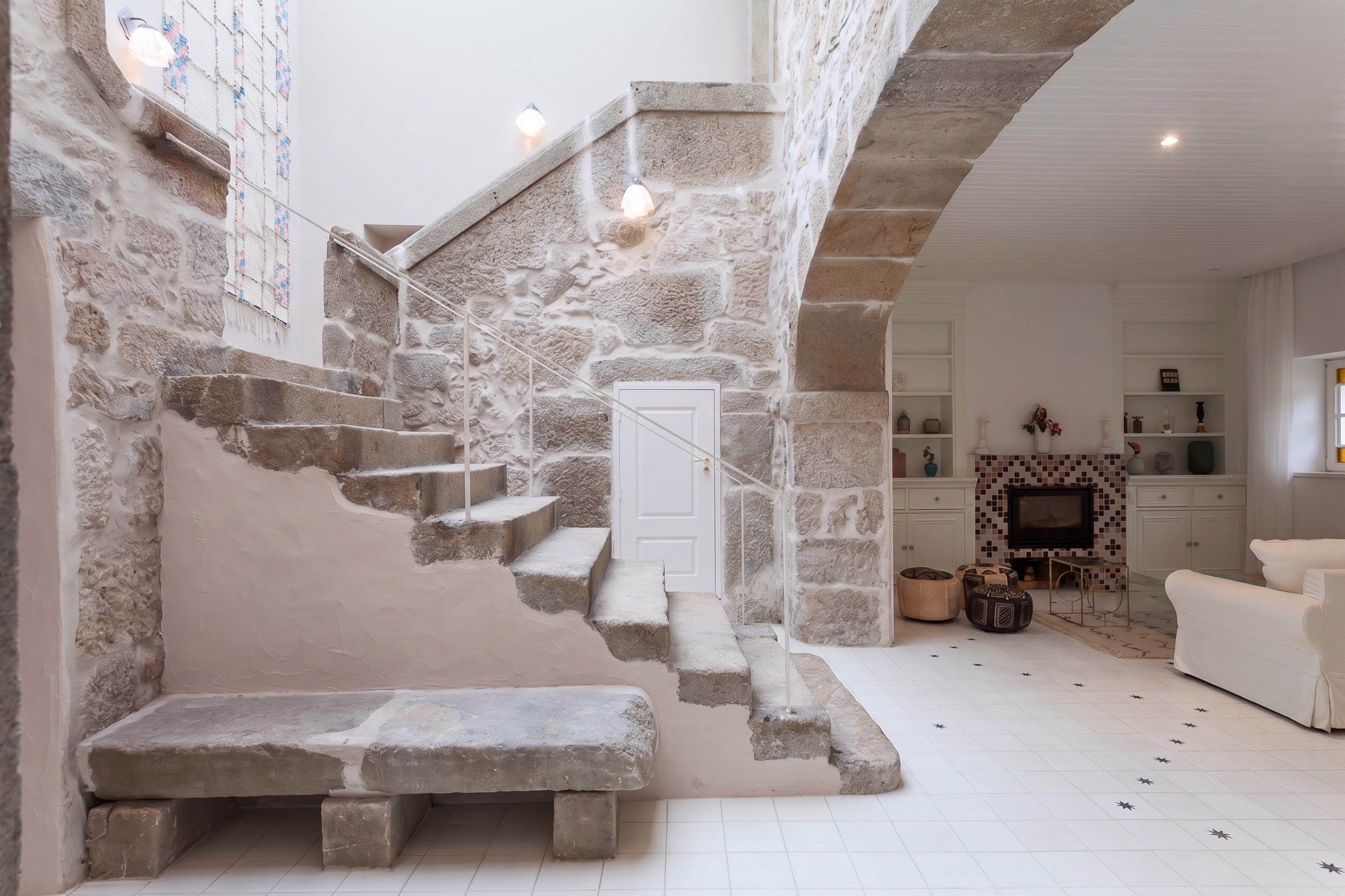 Inside Quinta de Sá — stone arches and warm light